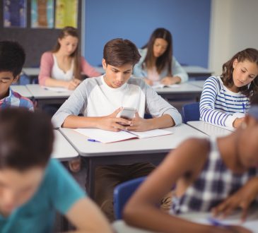 Students sitting at desks in classroom