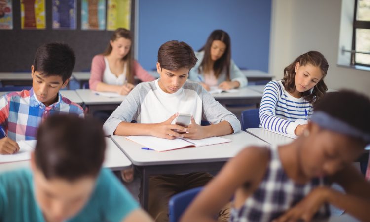 Students sitting at desks in classroom