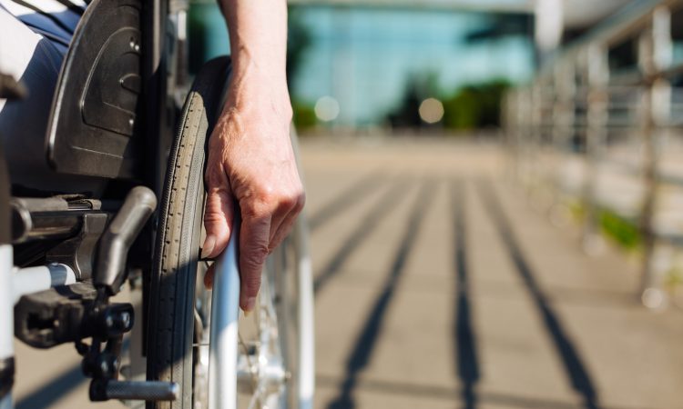 Closeup of person using wheelchair