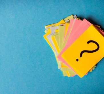 sticky notes with a question mark written on one