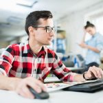 young man using computer