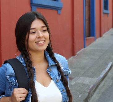Teen girl wearing backpack