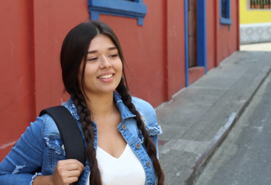 Teen girl wearing backpack