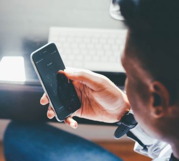 man looking at phone
