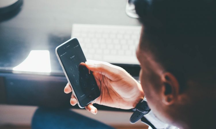 man looking at phone