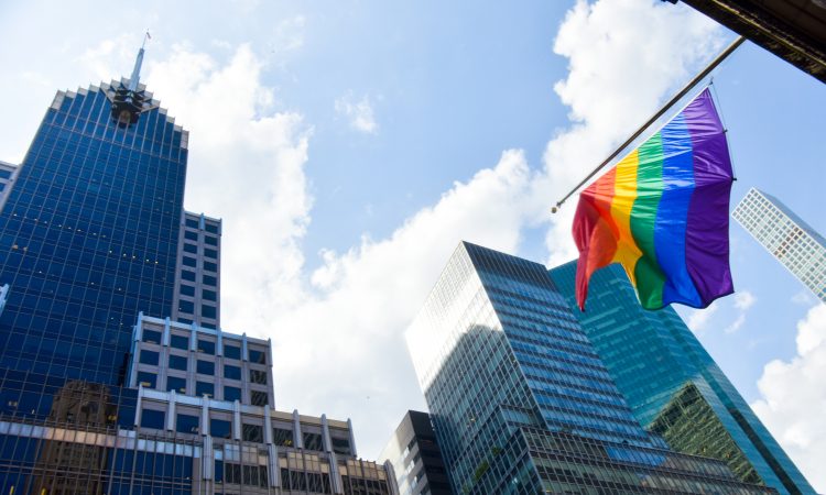 Rainbow flag flying from building