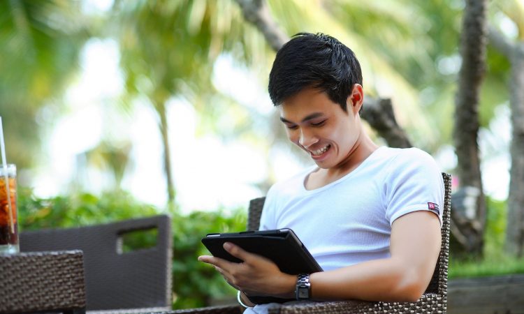 man using tablet