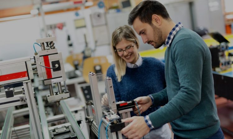 male and female engineering students working