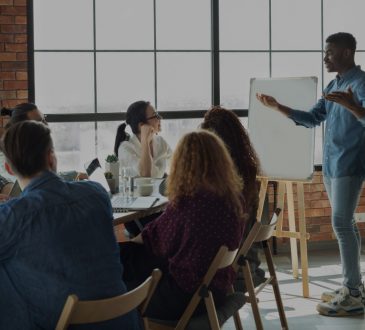 man presenting in office