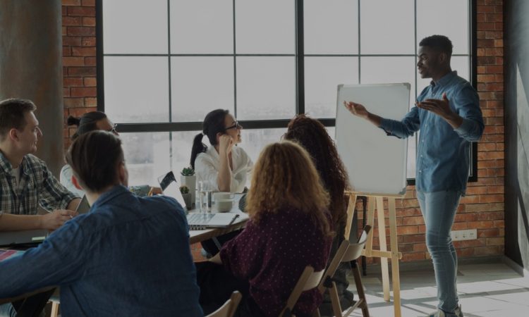 man presenting in office