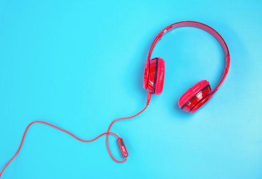 Headphones on blue background