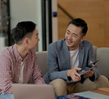 two men talking at work