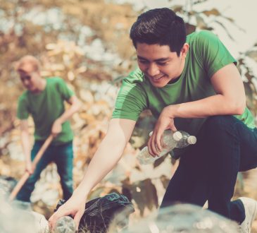 Volunteers picking up litter in the park