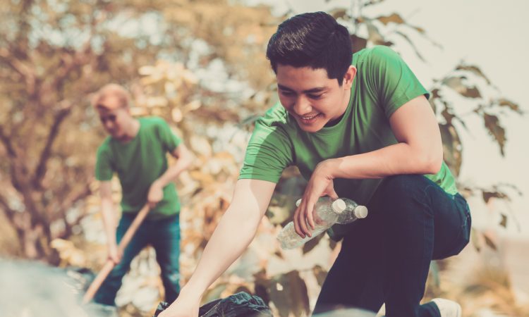 Volunteers picking up litter in the park