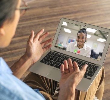 two men having video call