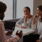 mother and daughter in meeting with teacher