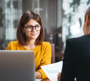 two women having meeting in office