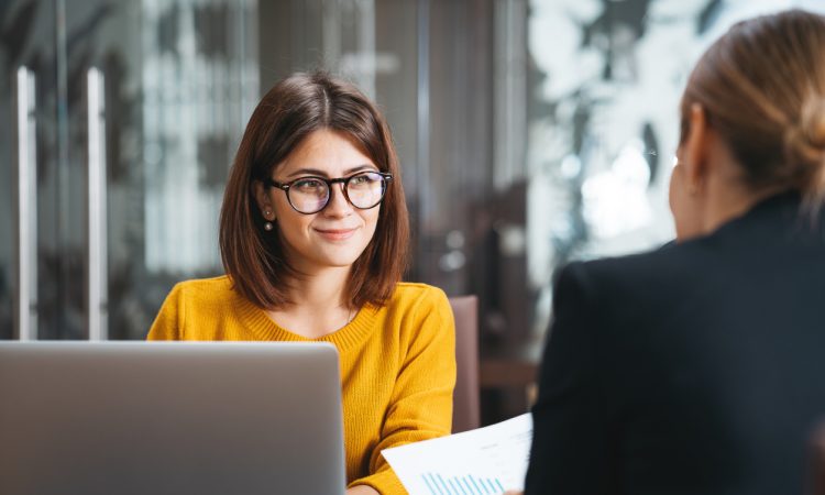 two women having meeting in office