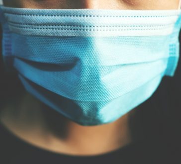 closeup of person wearing face mask