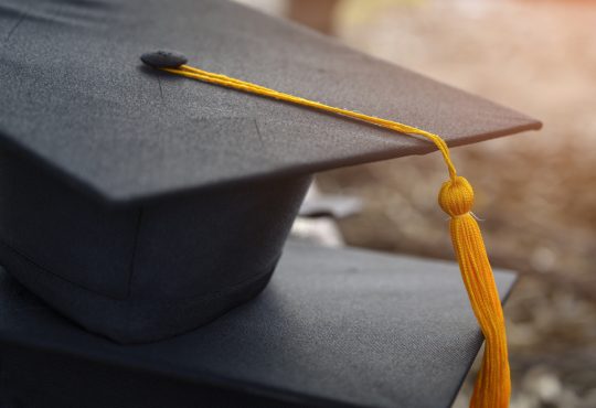 Black graduation cap.