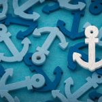 Background image of many blue and teal coloured anchors