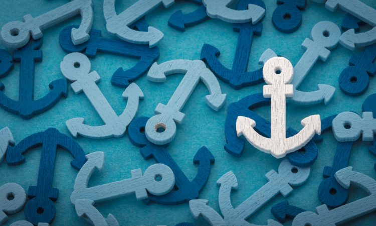 Background image of many blue and teal coloured anchors