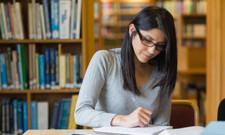 Woman studying in the library