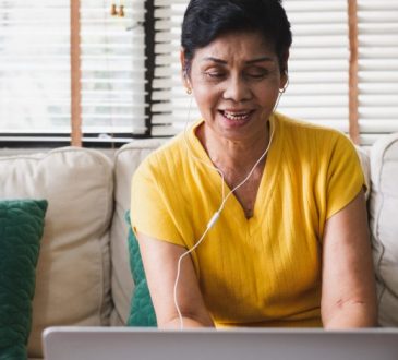 Woman typing on laptop