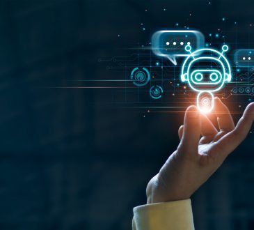 Hand touching digital chat bot