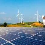 Electrical engineers are using laptops to monitor the operation of the solar rooftop