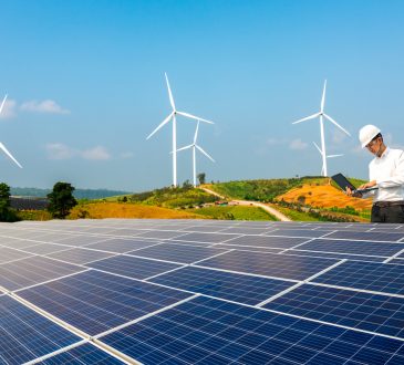 Electrical engineers are using laptops to monitor the operation of the solar rooftop