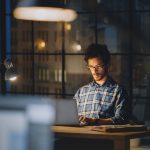 Man working at desk late at night