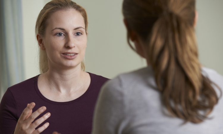 Two women talking