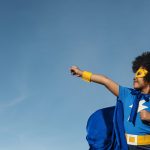 Kid wearing superhero costume
