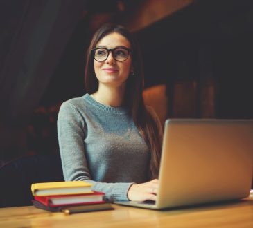 Female student working on laptop