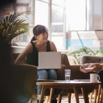 Man and woman laughing and talking