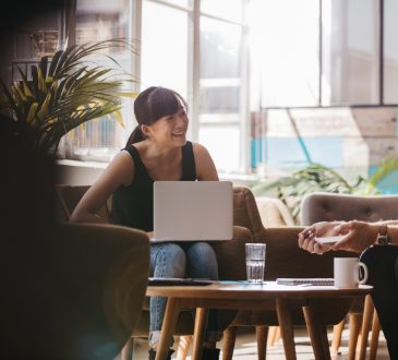 Man and woman laughing and talking