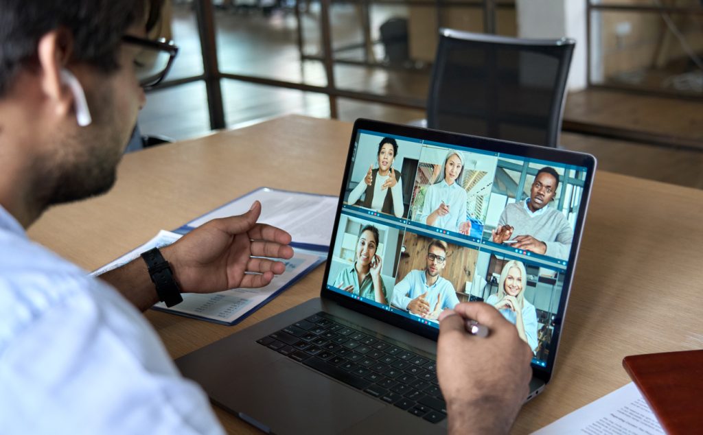 Man on video conference call on laptop