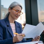 Woman looking at papers