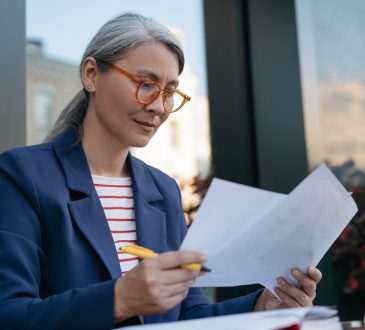 Woman looking at papers