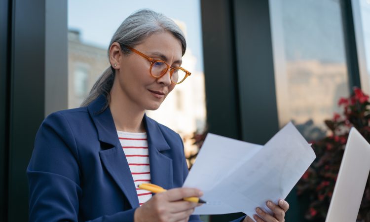 Woman looking at papers