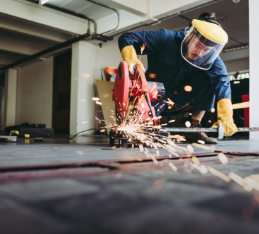 Craftsman Welding is Cutting Steel Work in Fabrication Workshop
