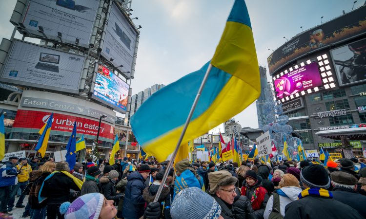 Hundreds gather to protest for Ukraine on December 15, 2013 at Yonge - Dundas Square in Toronto.