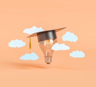 Photo illustration of lightbulb wearing graduation cap amid floating white clouds on peach background