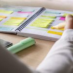 Close-up of hand writing in agenda