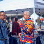 Two indigenous men talking to each other at Toronto city Hall’s Nathan Phillips Square for National Day for Truth and Reconciliation.