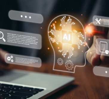Person typing on keyboard with icons representing technology and AI hovering on top
