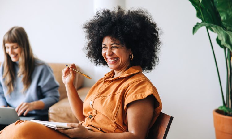Woman smiling during meeting in office