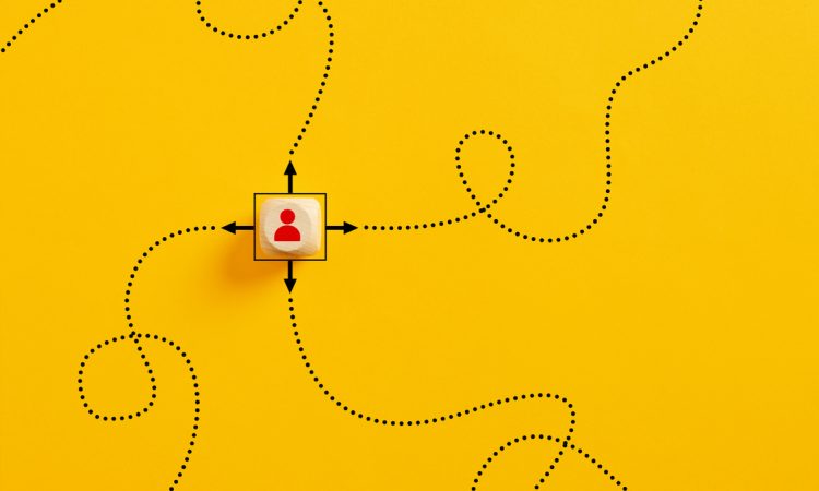 Icon of person in centre with looping pathways going out in different directions
