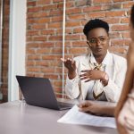 Two women meeting in office
